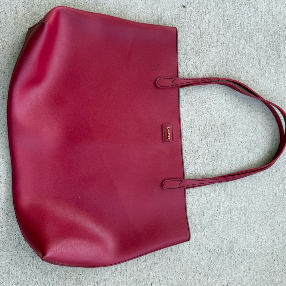 Bebe Red Leather Tote Bag with Structured Design